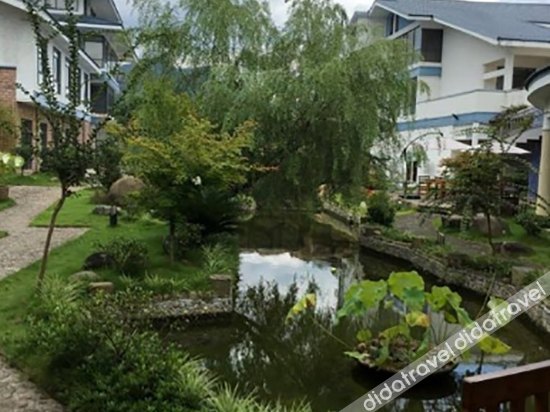 武夷山九曲绿地铂骊酒店(九曲溪竹筏码头店) photo 2
